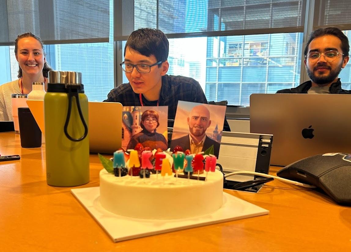 Zappasodi lab members and a cake