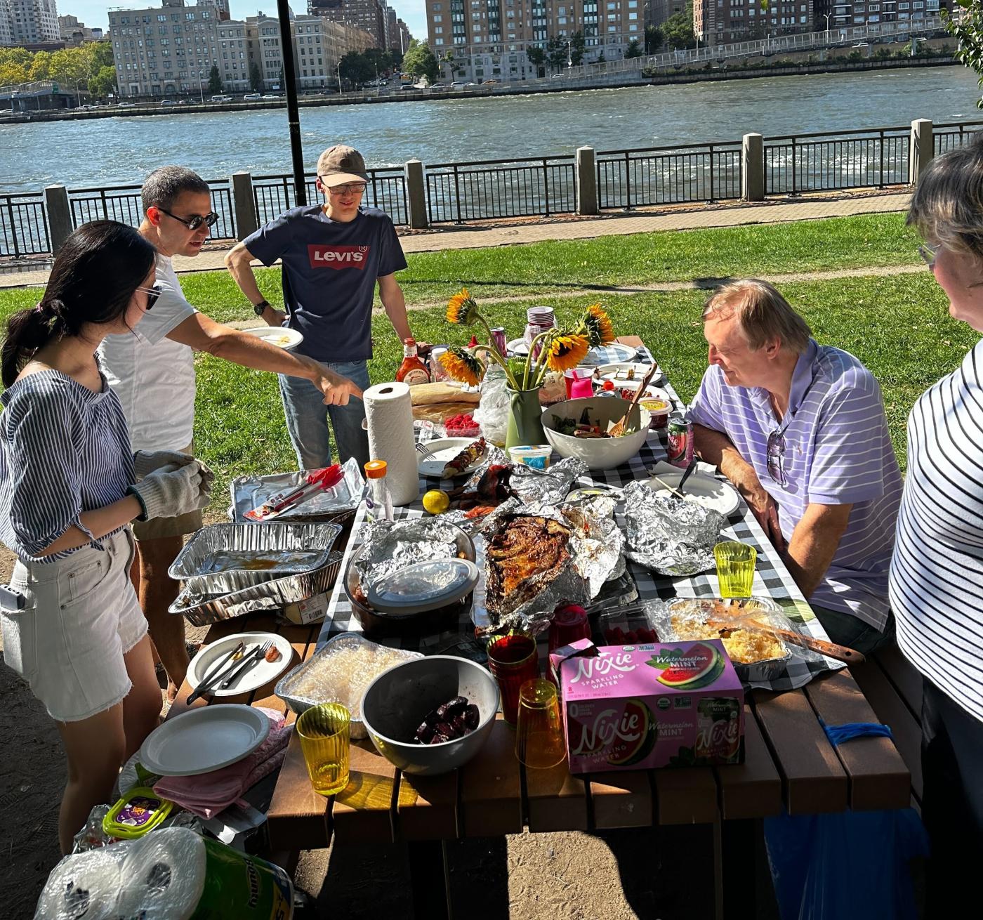 Zappasodi lab team on a picnic table 